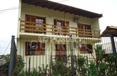 Casa com 3 quartos à venda na avenida natal, 241, medianeira, porto alegre por r$ 585.000