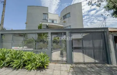 Casa com 3 quartos à venda na rua delfino riet, 461, santo antônio, porto alegre, 443 m2 por r$ 2.840.500