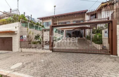 Casa com 3 quartos à venda na rua senador annibal di primio beck, 161, boa vista, porto alegre, 490 m2 por r$ 2.000.000