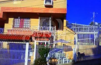 Casa com 3 quartos à venda na rua professor joaquim louzada, 104, camaquã, porto alegre, 226 m2 por r$ 599.000