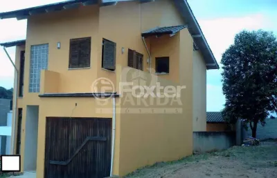 Casa em condomínio fechado com 3 quartos à venda na avenida juca batista, 2705, cavalhada, porto alegre, 190 m2 por r$ 550.000