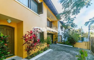 Casa com 3 quartos à venda na rua andré primo biazetto, 414, campo novo, porto alegre, 330 m2 por r$ 1.100.000