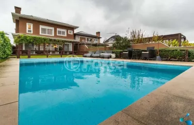 Casa em condomínio fechado com 4 quartos à venda na avenida juca batista, 9000, belém novo, porto alegre, 330 m2 por r$ 2.862.000
