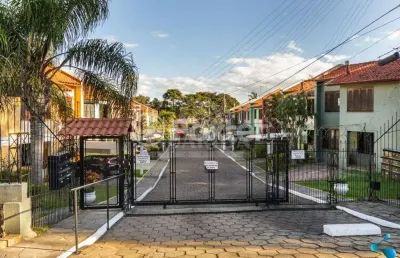 Casa em condomínio fechado com 3 quartos à venda na avenida juca batista, 4075, cavalhada, porto alegre, 99 m2 por r$ 390.000