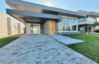Casa em condomínio fechado com 4 quartos à venda na undefined paraguassu, 1570, zona nova, capão da canoa, 200 m2 por r$ 2.900.000