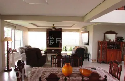 Casa em condomínio fechado com 4 quartos à venda na avenida juca batista, 9000, belém novo, porto alegre, 573 m2 por r$ 2.631.000