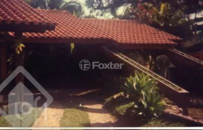 Casa com 3 quartos à venda na avenida desembargador mello guimarães, 260, belém novo, porto alegre, 600 m2 por r$ 2.000.000