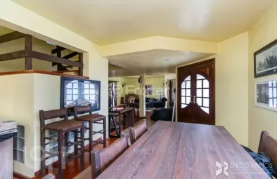 Casa com 3 quartos à venda na rua doutor ney cabral, 427, nonoai, porto alegre, 282 m2 por r$ 930.000