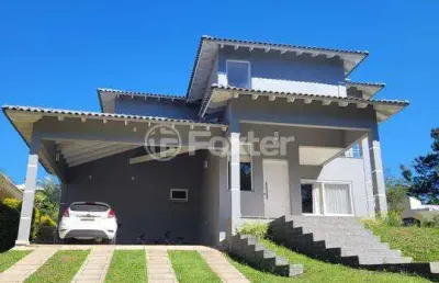 Casa em condomínio fechado com 3 quartos à venda na estrada capitão gentil machado de godoy, 4500, vila elsa, viamão, 720 m2 por r$ 1.450.000