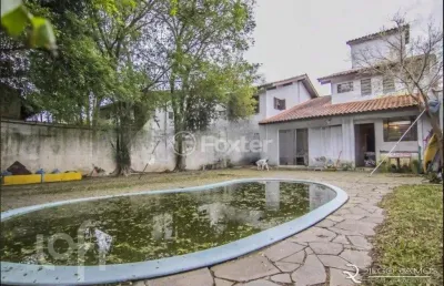 Casa com 4 quartos à venda na rua manoel leão, 45, pedra redonda, porto alegre, 203 m2 por r$ 600.000