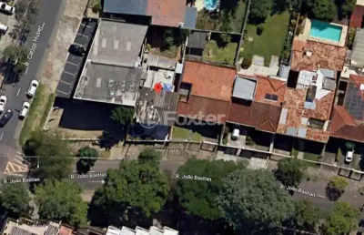 Terreno à venda na rua joão bastian, 24, três figueiras, porto alegre, 332 m2 por r$ 1.276.800