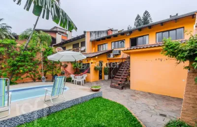 Casa com 4 quartos à venda na avenida cai, 380, cristal, porto alegre, 435 m2 por r$ 1.350.000