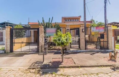 Casa com 3 quartos à venda na rua carmense, 165, parque santa fé, porto alegre, 218 m2 por r$ 650.000