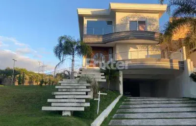 Casa em condomínio fechado com 4 quartos à venda na avenida senador salgado filho, 8500, vila augusta, viamão, 534 m2 por r$ 2.750.000