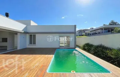 Casa em condomínio fechado com 3 quartos à venda na estrada das três meninas, 1501, vila nova, porto alegre, 339 m2 por r$ 2.100.000