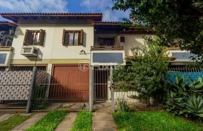 Casa em condomínio fechado com 3 quartos à venda na rua itapitocaí, 1031, cristal, porto alegre, 105 m2 por r$ 430.000