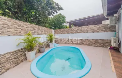 Casa em condomínio fechado com 4 quartos à venda na estrada joão salomoni, 600, vila nova, porto alegre, 191 m2 por r$ 890.000