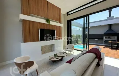 Casa em condomínio fechado com 4 quartos à venda na rua honorio ferreira da silva, 2009, arco íris, capão da canoa, 185 m2 por r$ 1.770.000