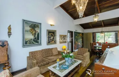 Casa com 4 quartos à venda na rua professor guerreiro lima, 746, partenon, porto alegre, 200 m2 por r$ 1.100.000
