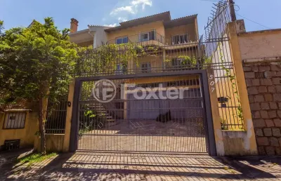 Casa com 5 quartos à venda na rua isidoro tressi, 507, jardim botânico, porto alegre, 380 m2 por r$ 1.530.000