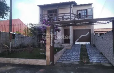 Casa com 3 quartos à venda na rua condores, 565, jardim algarve, alvorada, 170 m2 por r$ 508.800