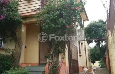 Casa com 3 quartos à venda na rua oscar schneider, 47, medianeira, porto alegre, 260 m2 por r$ 750.000