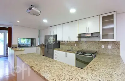 Casa em condomínio fechado com 3 quartos à venda na avenida juca batista, 8000, belém novo, porto alegre, 240 m2 por r$ 1.368.000