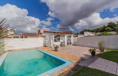 Casa com 4 quartos à venda na rua delfino riet, 350, santo antônio, porto alegre, 414 m2 por r$ 1.064.000