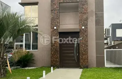 Casa em condomínio fechado com 3 quartos à venda na avenida senador salgado filho, 8500, querência, viamão, 187 m2 por r$ 1.590.000