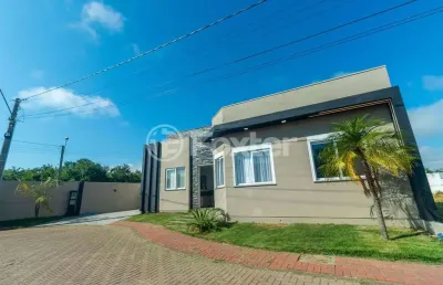 Casa em condomínio fechado com 3 quartos à venda na rua das cerejeiras, 43, parque da matriz, gravataí, 120 m2 por r$ 1.070.000