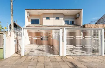 Casa com 3 quartos à venda na avenida alberto pasqualini, 999, jardim itu sabará, porto alegre, 149 m2 por r$ 950.000