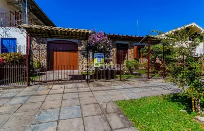 Casa com 3 quartos à venda na avenida irene ruperti, 179, parque santa fé, porto alegre, 155 m2 por r$ 549.000