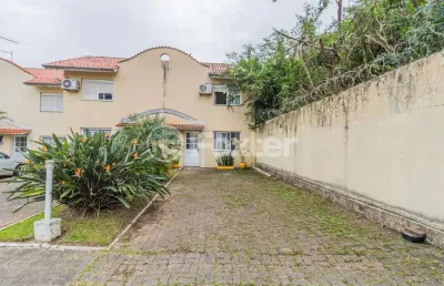 Casa em condomínio fechado com 2 quartos à venda na avenida edgar pires de castro, 350, hípica, porto alegre, 118 m2 por r$ 314.000