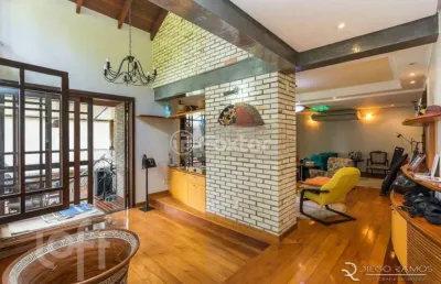 Casa em condomínio fechado com 4 quartos à venda na rua erechim, 100, nonoai, porto alegre, 331 m2 por r$ 1.050.000