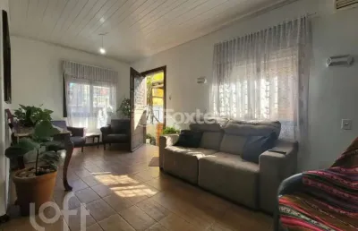 Casa com 6 quartos à venda na rua antônio joaquim mesquita, 60, passo da areia, porto alegre, 300 m2 por r$ 1.070.000