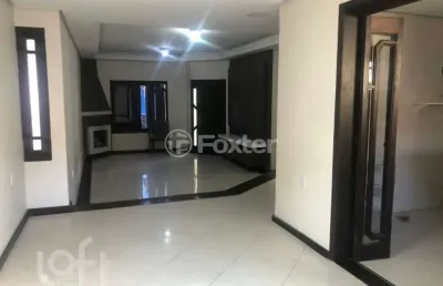 Casa com 3 quartos à venda na rua juvenil pereira fraga, 104, cavalhada, porto alegre, 300 m2 por r$ 760.000