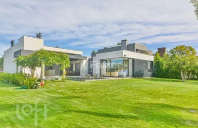 Casa em condomínio fechado com 4 quartos à venda na avenida juca batista, 8000, belém novo, porto alegre, 418 m2 por r$ 3.590.000