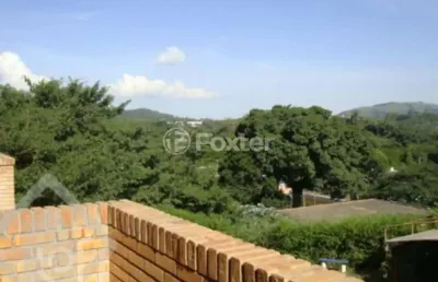 Casa em condomínio fechado com 3 quartos à venda na avenida vicente monteggia, 2212, cavalhada, porto alegre, 139 m2 por r$ 700.000