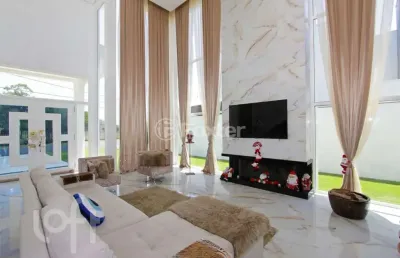 Casa em condomínio fechado com 5 quartos à venda na avenida juca batista, 9000, belém novo, porto alegre, 388 m2 por r$ 4.780.000