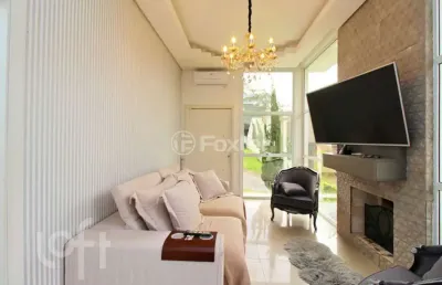 Casa em condomínio fechado com 4 quartos à venda na avenida juca batista, 2705, hípica, porto alegre, 95 m2 por r$ 750.000