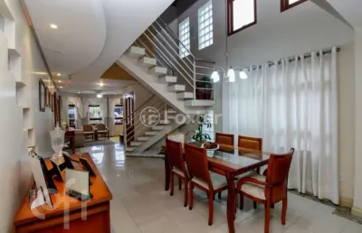 Casa com 3 quartos à venda na avenida ecoville, 190, sarandi, porto alegre, 210 m2 por r$ 1.500.000