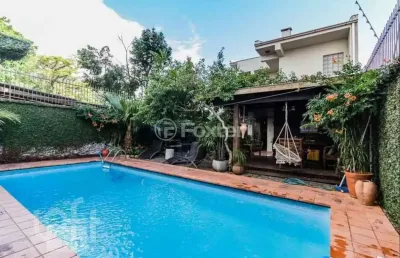 Casa com 5 quartos à venda na rua itaboraí, 1490, jardim botânico, porto alegre, 370 m2 por r$ 1.800.000
