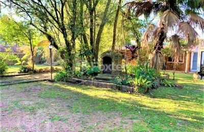 Casa com 4 quartos à venda na avenida desembargador mello guimarães, 235, belém novo, porto alegre, 181 m2 por r$ 750.000