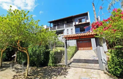 Casa com 4 quartos à venda na rua dona lida monteiro, 140, teresópolis, porto alegre, 195 m2 por r$ 1.220.000