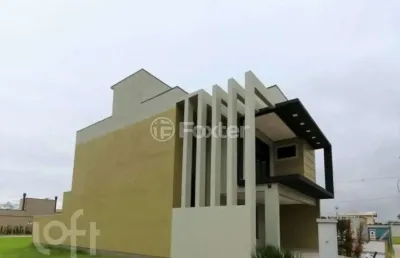 Casa em condomínio fechado com 3 quartos à venda na rua cairu, 440, rio branco, canoas, 177 m2 por r$ 1.390.000