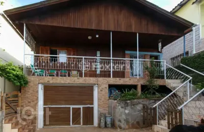 Casa com 4 quartos à venda na avenida doutor sezefredo azambuja vieira, 5729, olaria, canoas, 300 m2 por r$ 620.000