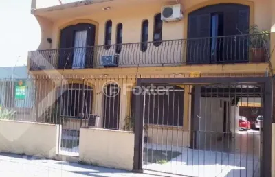 Casa com 4 quartos à venda na rua márcio dias, 340, nonoai, porto alegre, 450 m2 por r$ 700.000