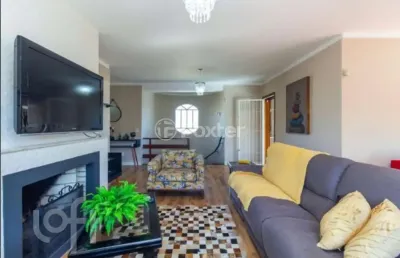 Casa com 4 quartos à venda na rua criciúma, 115, guarujá, porto alegre, 288 m2 por r$ 1.500.000