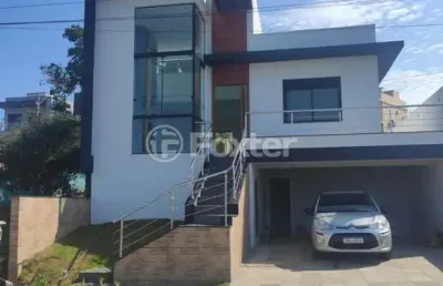 Casa em condomínio fechado com 3 quartos à venda na rua lino estácio dos santos, 1001, oriço, gravataí, 142 m2 por r$ 1.090.000