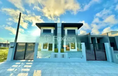 Casa com 3 quartos à venda na rua flavio schaeffer, 325, guarani, capão da canoa, 99 m2 por r$ 780.000